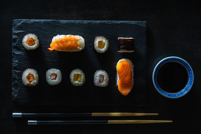 High angle view of sushi served on table