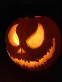 Close-up of pumpkin against black background