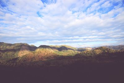 View of landscape against cloudy sky