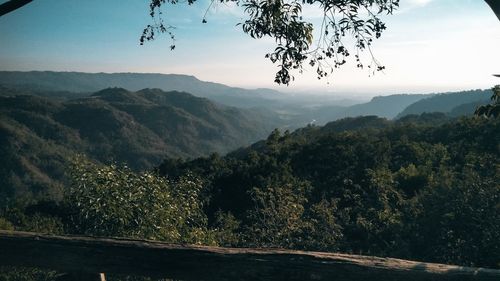 Scenic view of mountains against sky at sunset