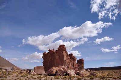 Scenic view of landscape against blue sky