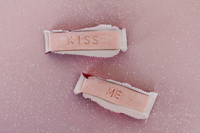 Close-up of love text against gray background