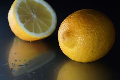 Close-up of oranges on table