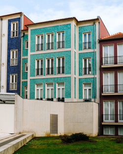 Exterior of residential buildings against sky