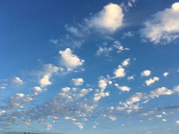 Low angle view of clouds in blue sky