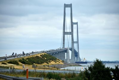 View of bridge against cloudy sky