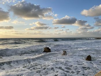 Scenic view of sea against sky during sunset