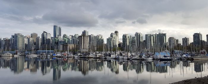 Boats moored at harbor