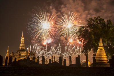 Firework display at night