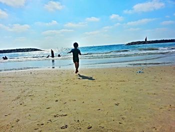 Scenic view of beach against sky