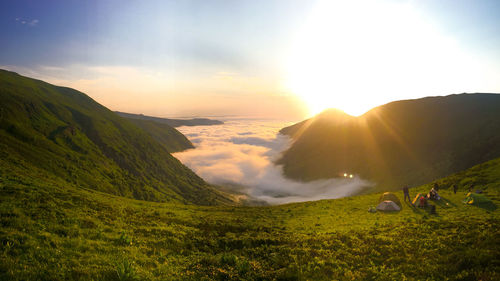 Scenic view of mountains against sky during sunset