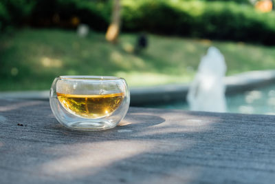 Tea in cup on wooden table