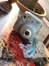 High angle view of camera on table