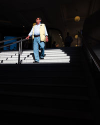 Man standing on staircase
