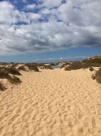 Scenic view of beach against sky