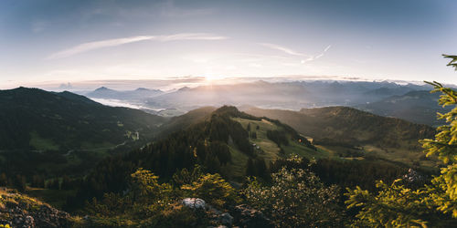 Scenic view of mountains against sky during sunset