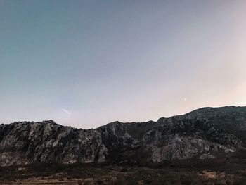 Scenic view of mountains against clear sky