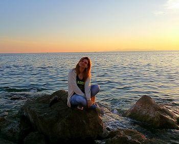 Scenic view of sea at sunset