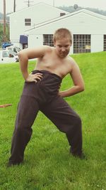 Girl playing on grassy field