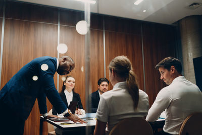 Group of people standing at home