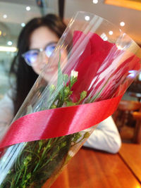 Portrait of woman holding bouquet