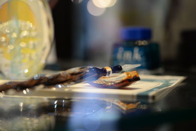 Close-up of crab on glass table