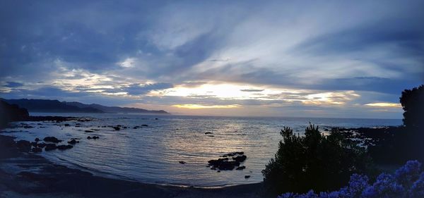 Scenic view of sea against sky during sunset