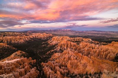 Aerial view of landscape against sky during sunset