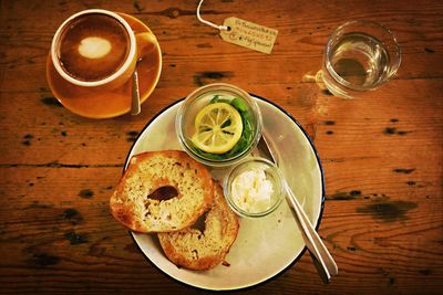 Directly above shot of coffee on wooden table