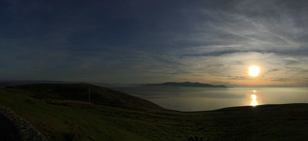 Scenic view of landscape against sky during sunset