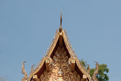 Low angle view of statue against sky