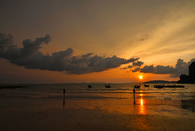 Scenic view of sea at sunset