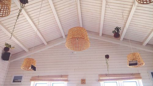 Low angle view of wicker basket hanging