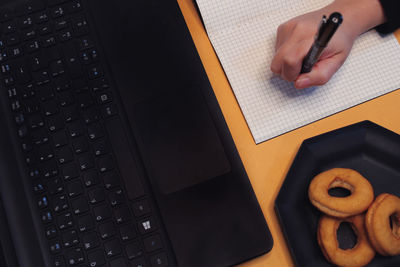 High angle view of mobile phone on table