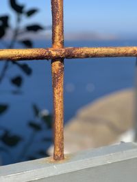 Close-up of rusty metal fence