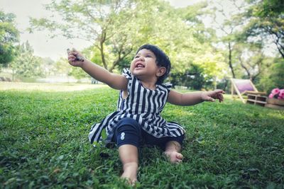 Full length of girl on field