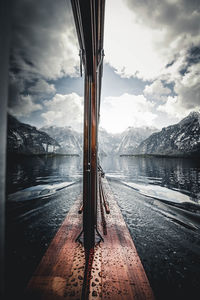Scenic view of lake against sky during winter