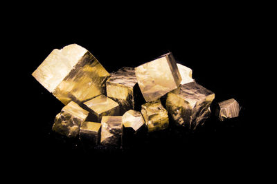 Close-up of rocks against black background