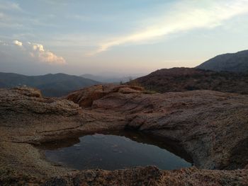 Scenic view of mountains against sky during sunset