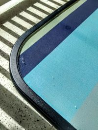 High angle view of metallic container at swimming pool