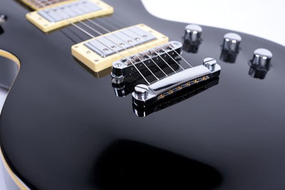 High angle view of guitar on table