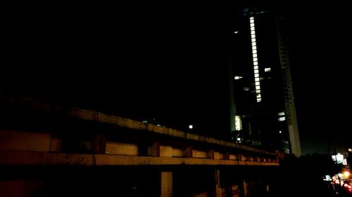 Low angle view of illuminated building at night