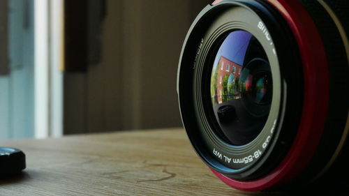 Close-up of camera on table