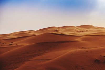 Scenic view of desert against clear sky