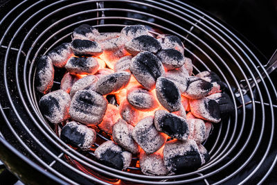 Close-up of meat on barbecue grill