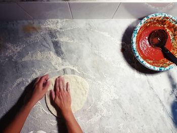 High angle view of person preparing food