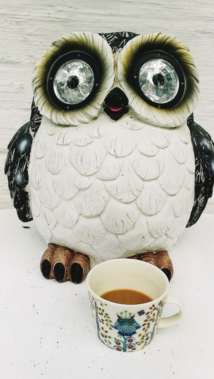 CLOSE-UP OF COFFEE SERVED ON TABLE