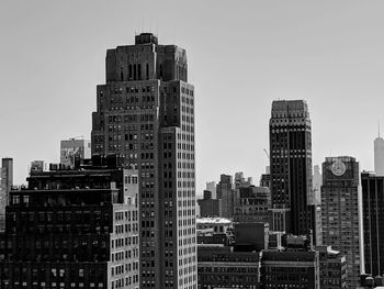 Modern buildings against clear sky