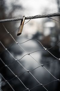 Low angle view of barbed wire fence