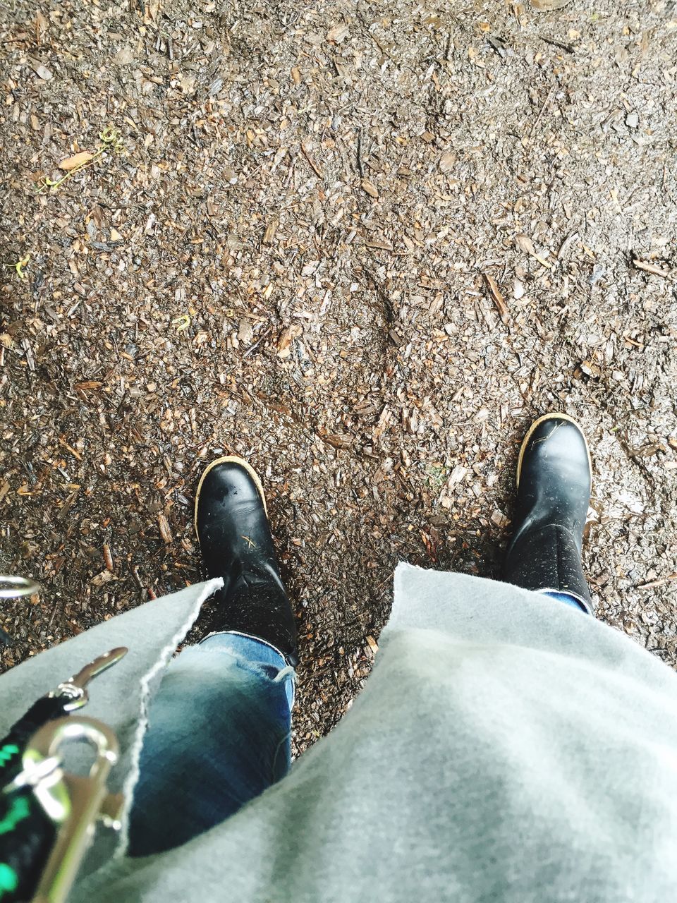 shoe, low section, person, high angle view, footwear, personal perspective, street, road, human foot, asphalt, standing, jeans, pair, directly above, canvas shoe, day, ground